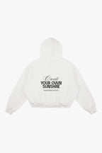 hoodie branca com arte "Ceate your own sunshine" em glitter preto
