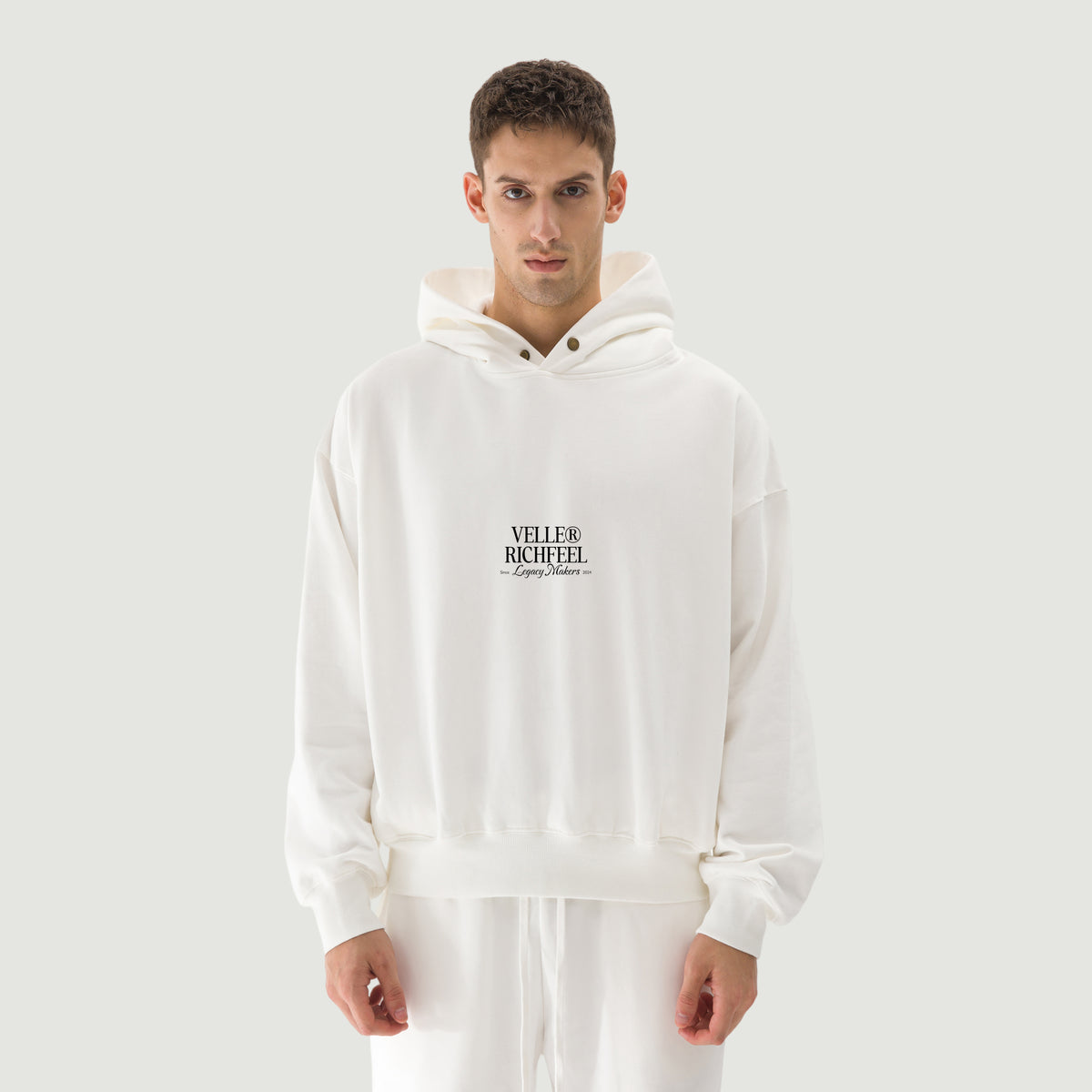 white hoodie with “Create your own sunshine” design in black glitter